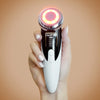 Handheld EMS face massager suitable for daily or occasional skincare use