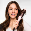 Heated round brush with tourmaline ceramic barrel and ionic function