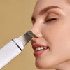 Ultrasonic skin scrubber spatula for lifting dirt and dead skin cells