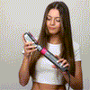 Hot air styler with multiple attachments for shaping and smoothing hair