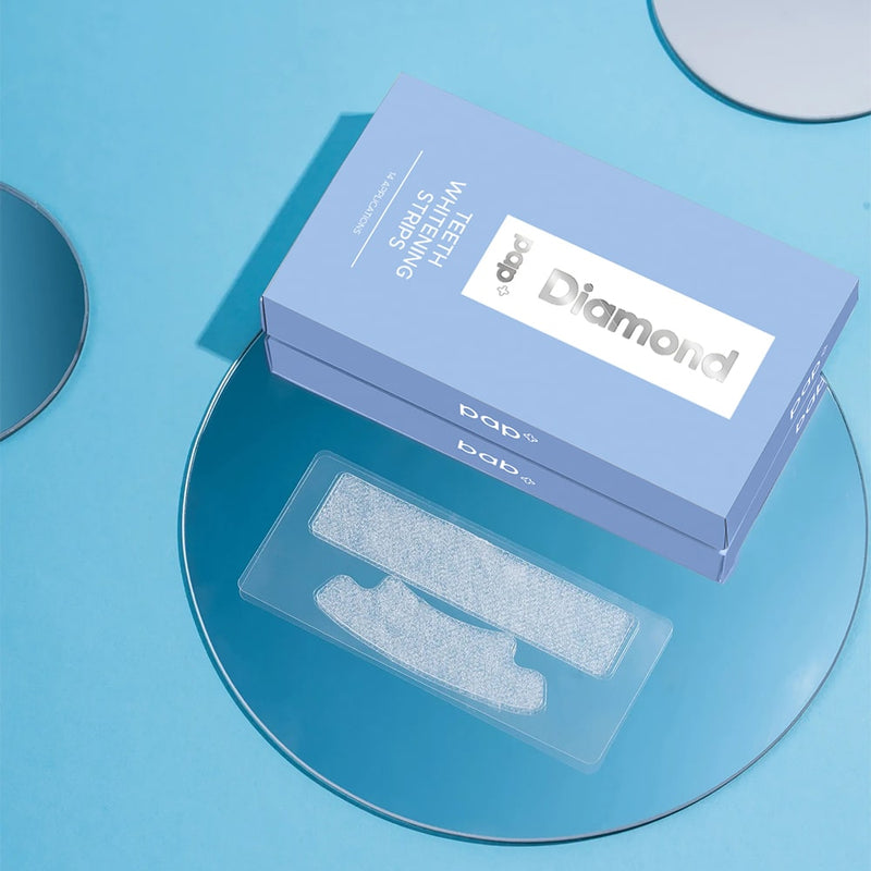 Packaging and PAP+ tooth whitening strips from Diamond Smile