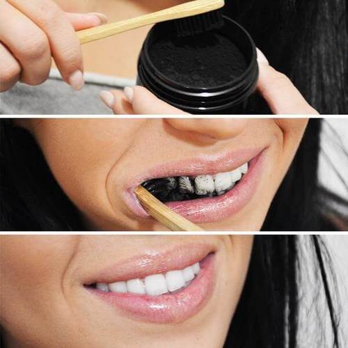 A woman's application of Diamond Smile tooth whitening activated charcoal powder Coco Powder
