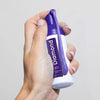 Diamond Smile tooth whitening purple color correction foam in one hand